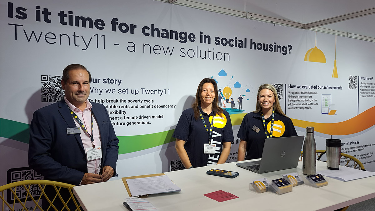 The Twenty11 team on their stand at the Housing 2023 conference in Manchester